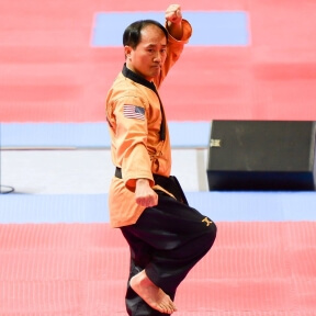 Master Lee doing poomsae while competing